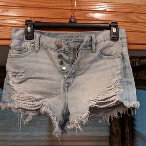 Destressed blue jean shorts